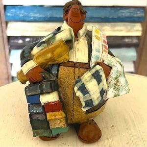 Sara Meadows pottery art balloon people, interior decorator, 5” high. Like new.